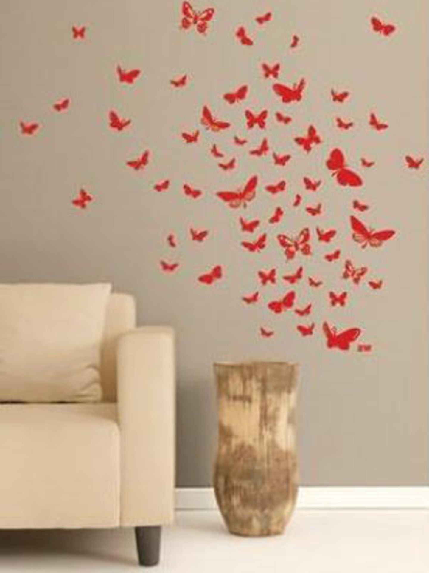 Schmetterlinge an meiner Wand    32-tlg. Set, bestehend aus roten Tapetenstickern im Schmetterlings-Design.     Preis: ca. 59 Euro, über  www.design3000.de