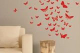 Schmetterlinge an meiner Wand    32-tlg. Set, bestehend aus roten Tapetenstickern im Schmetterlings-Design.     Preis: ca. 59 Euro, über  www.design3000.de