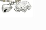 Perlenkette mit silbernem Elefanten- und Herzanhänger von Jubel & Stern, um 80 Euro. Über www.impressionen.de.