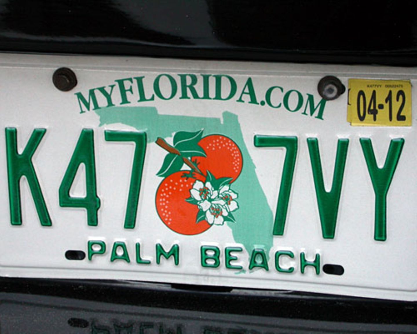 Die Floridianer – wie der Besitzer dieses Wagens aus Palm Beach – haben die wohl schönsten Autokennzeichen in den USA: Verziert mit Orangen.