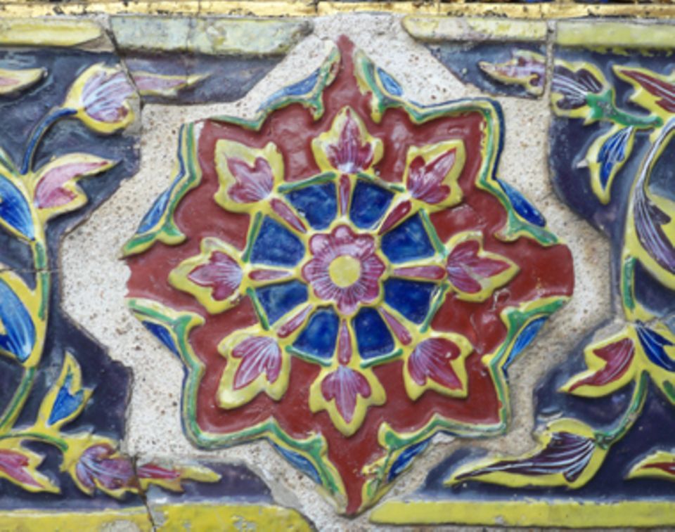Mandala-Mosaike zieren viele thailändischen Tempelanlagen im Süden des Landes.