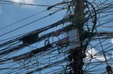 Die elektrischen Leitungen in Bangkok sind ähnlich verwirrend wie das Straßennetz der Hauptstadt.
