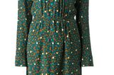 70er-Kleid mit grafischem Print und großer Schluppe, knielang von Jean Louis Scherrer Vintage über Farfetch, 450 Euro.