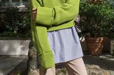 Streetstyle von der London Fashion Week mit grünem Pullover