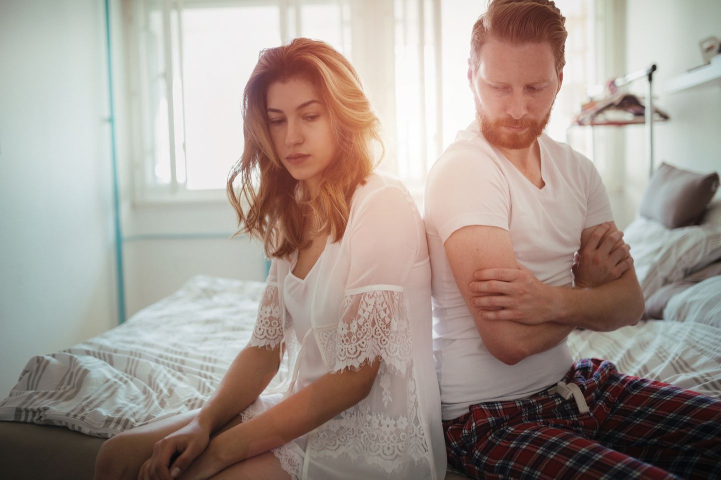 Was verunsichert Männer: Paar im Bett