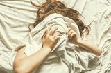 Erotische Träume deuten: Frau im Bett