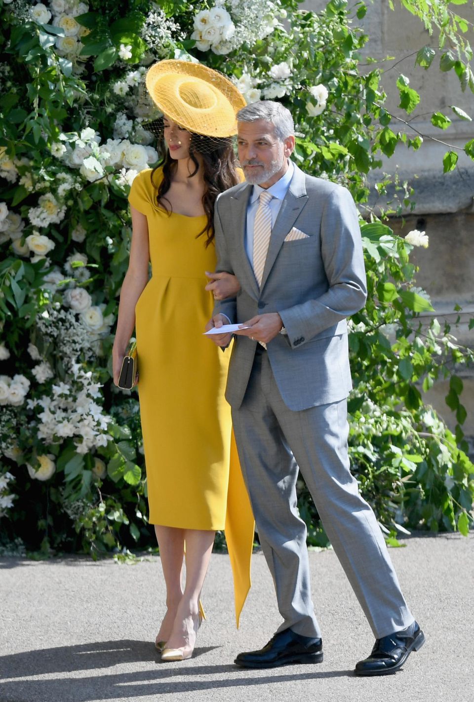 Hollywoods Crème de la Crème: In strahlendem Sonnengelb verzaubern George und Amal Clooney. 