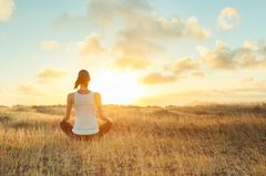 Relieve stress: woman meditates