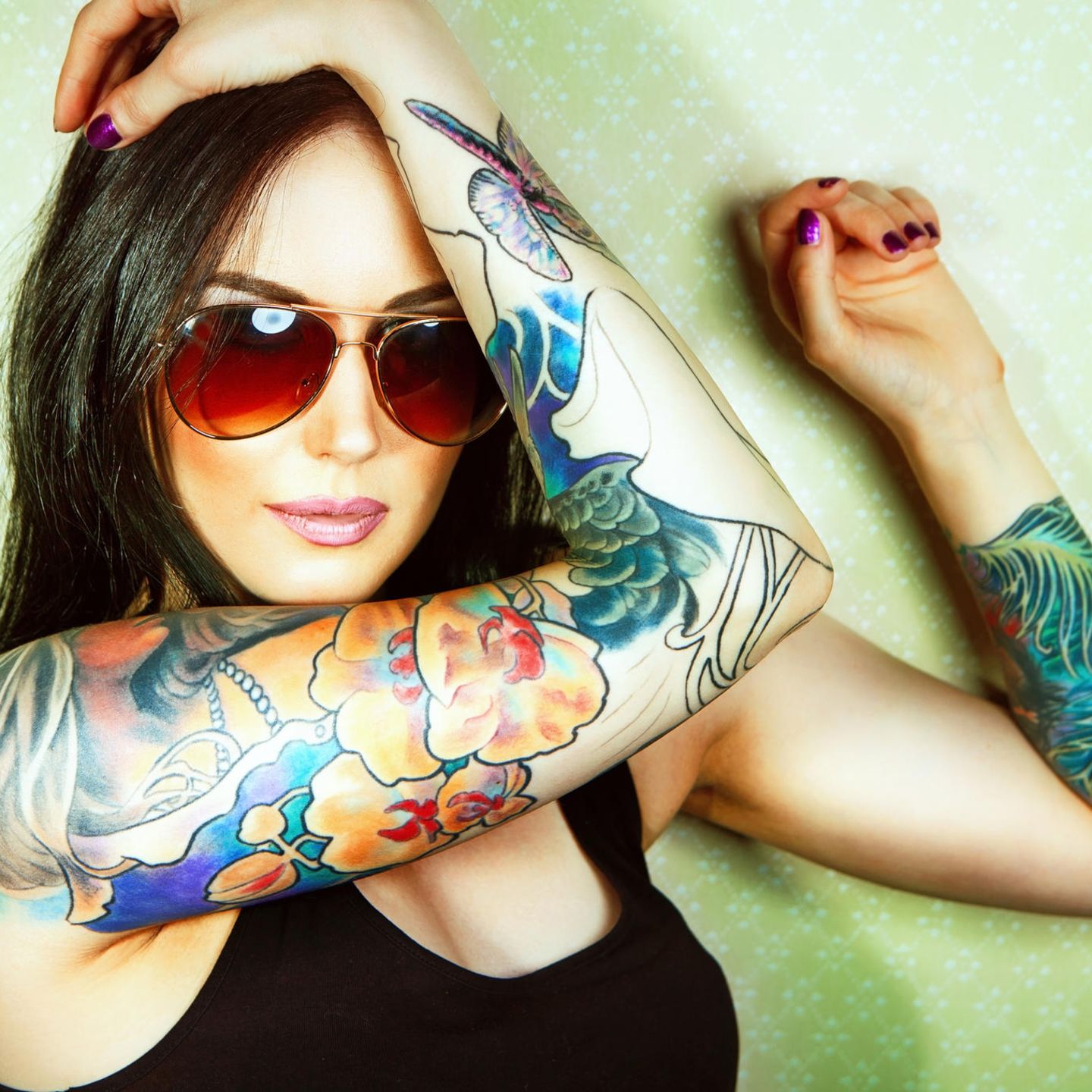 Tattoo am Arm: Farbiges Tattoo am Arm