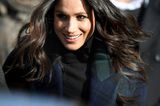 Meghan Markle with loose hair "loading =" lazy