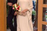 Schuhe der Royals: Meghan Markle hochschwanger mit Blumen