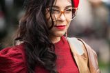 Winter-Frisuren: Frau mit rotem Hut