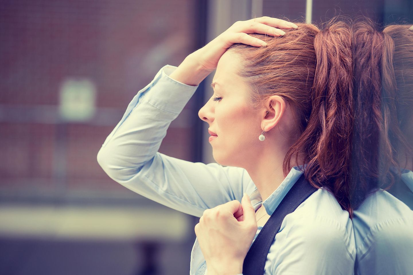 Stress-Symptome: Gestresste Frau