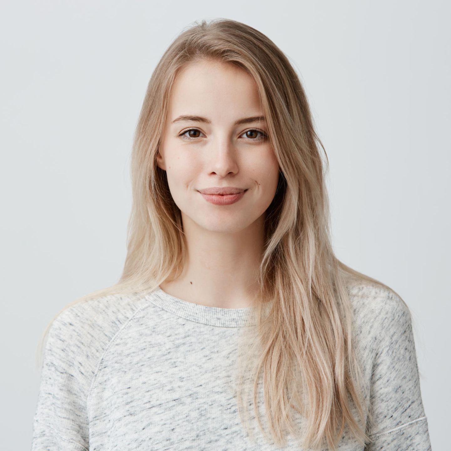 Young woman smiles at the camera