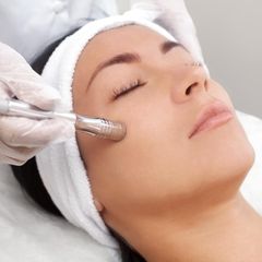 Microdermabrasion: woman undergoes treatment