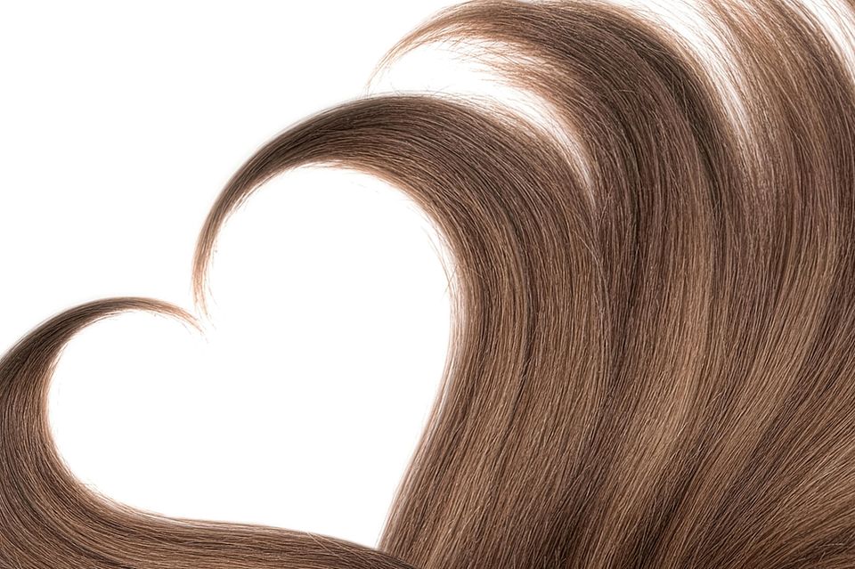 Flüssiges Glück: Öl für Haut & Haare Haare in Herzform