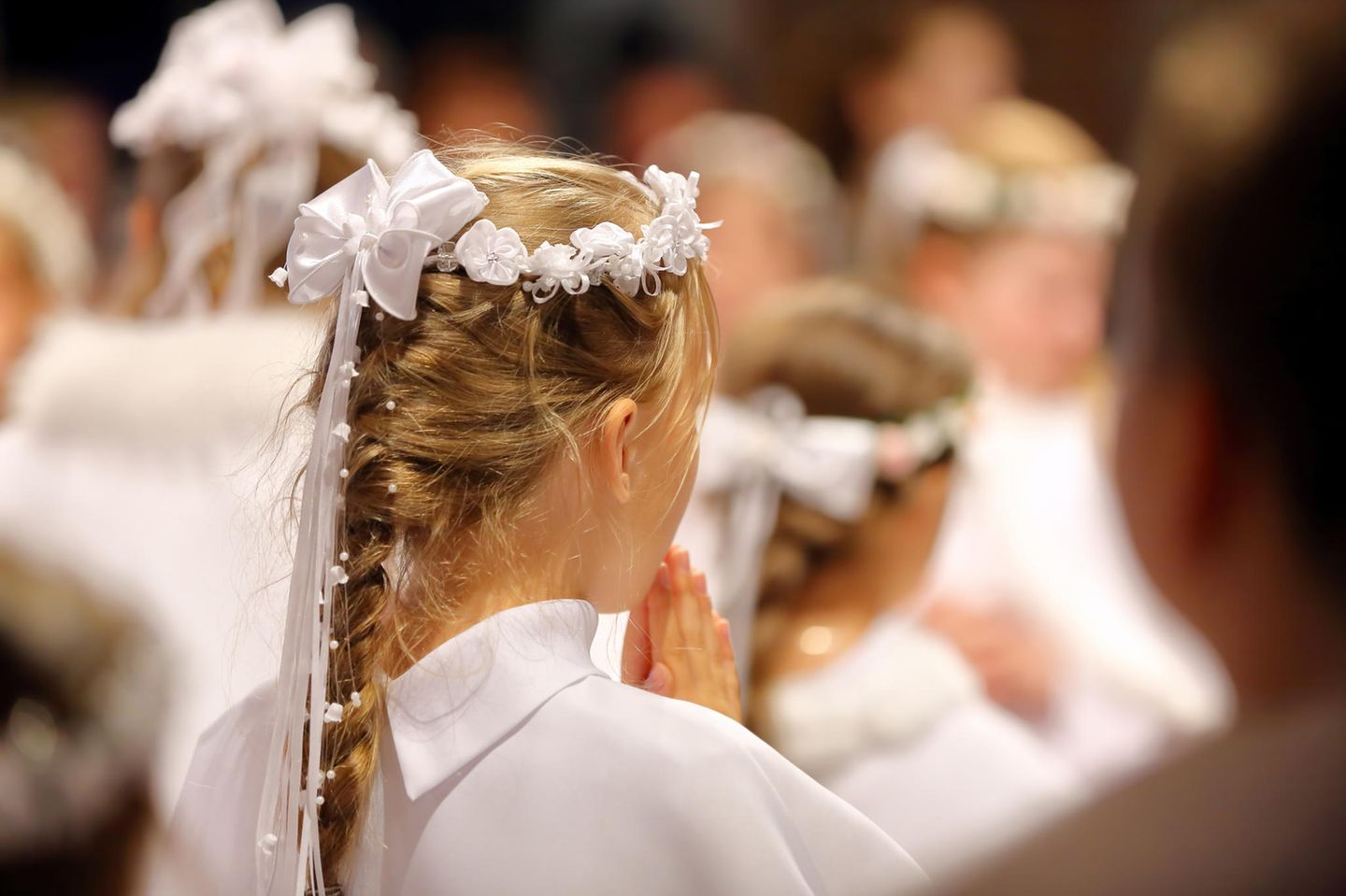Kommunionsfrisuren: Geflochtene Haare