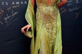 Victoria Beckham: in einem grünen Kleid