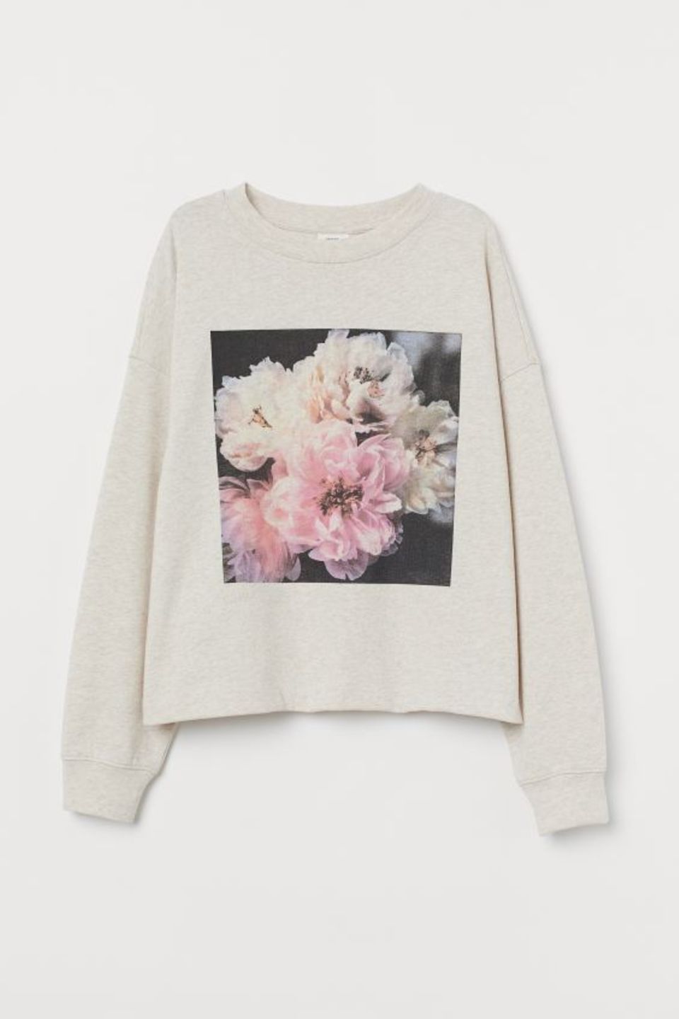 Cremefarbenes Sweatshirt mit Blumen-Print. Von H&M, um 20 Euro.