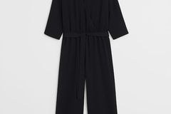 Classic black with 3/4 sleeves and waist band. By Violeta by Mango, around 80 euros.