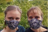 "Ein Schutz fürs Leben": Frau und Mädchen mit Masken