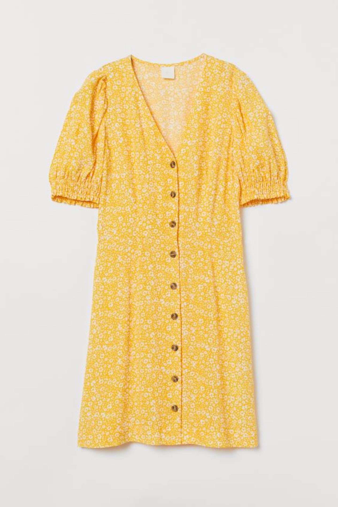 Wir sind bereits ganz vorne im Puffärmel-Game dabei – du auch? Falls nein, besteht definitiv Aufholbedarf. Dieses süße Kleidchen ist das perfekte Einsteigermodell. Von H&M, um 20 Euro.