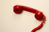 Familienleben: Telefonhöherer in rot