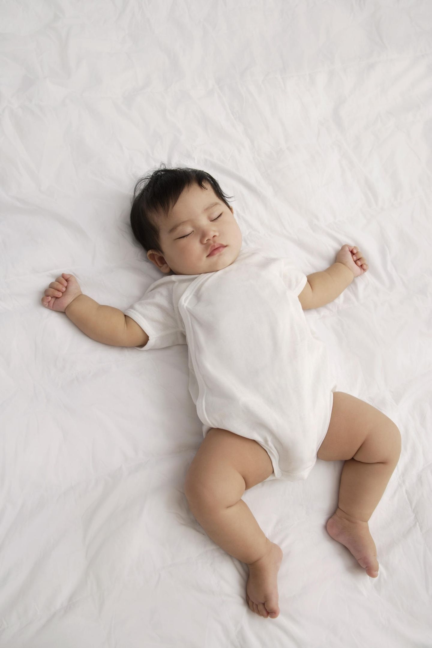 Babykleidung: Schlafendes Baby