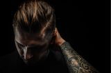 Väter-Zweifel: Mann mit Tattoos