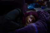 World Press Photo 2021: Frau liegt im Bett