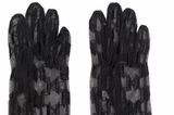 Transparente Handschuhe sind nicht nur für die Silvesternacht total angesagt, auch im kommenden Jahr wird das Accessoire überall zu sehen sein. Transparente Handschuhe von Karl Lagerfeld über Farfetch, kosten ca. 80 Euro. 