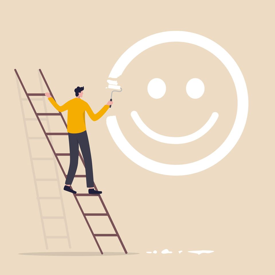 Optimistisch werden: Grafik eines Mannes der auf einer Leiter steht und einen Smiley an die Wand malt