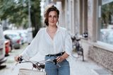 Geburtshilfe weltweit: Hebamme Kareen Dannhauer mit Fahrrad