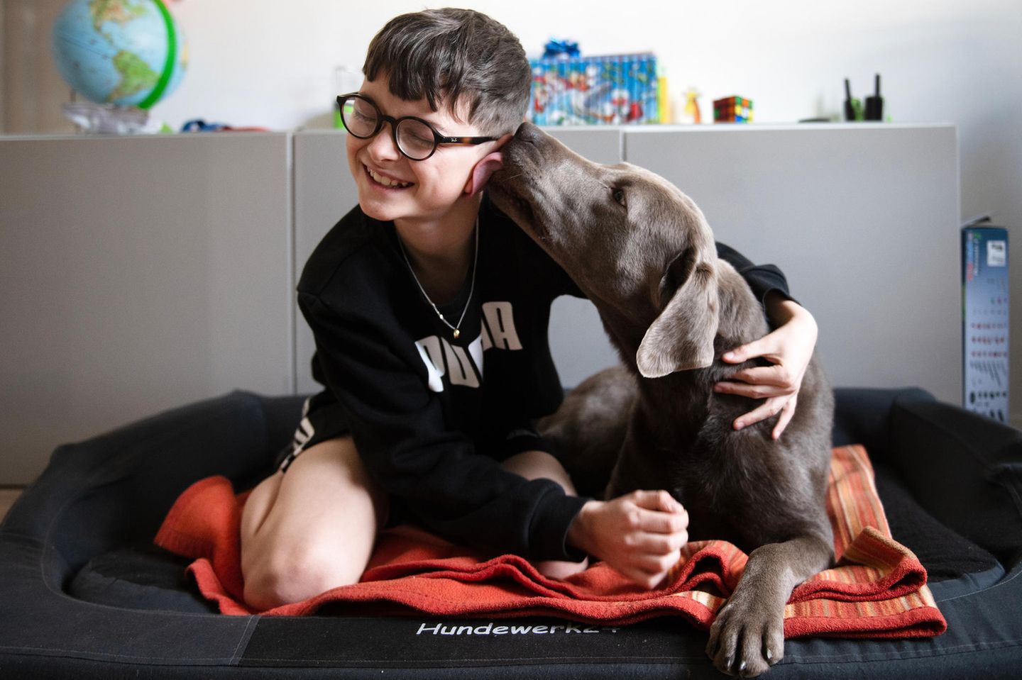Unicef Foto des Jahres 2023: Junge mit Hund