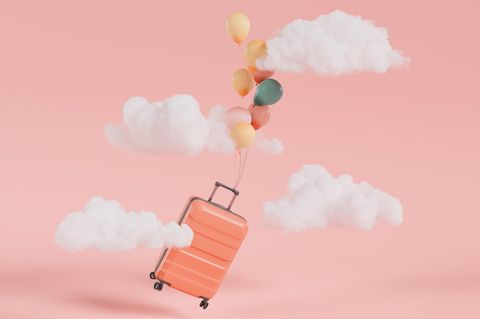 Koffer mit Luftballons