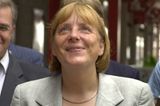 Angela Merkel: mit typischer Geste
