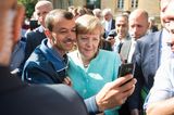 Angela Merkel: Selfie mit Flüchtling