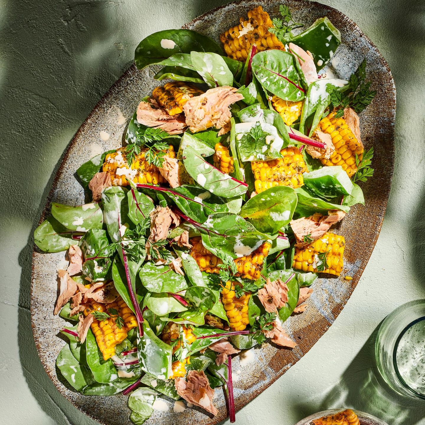 Mangold and corn salad with tuna and spicy dressing